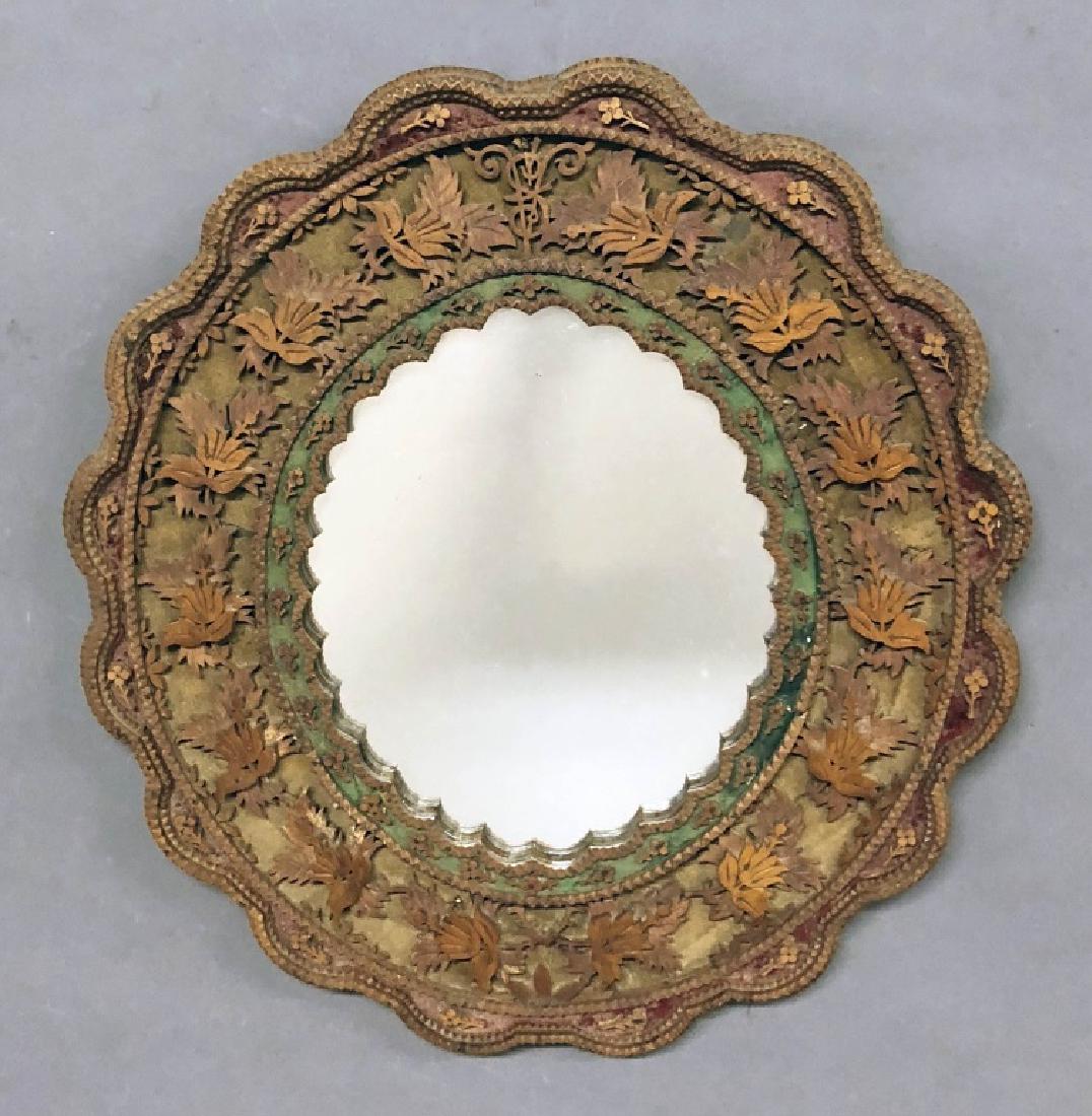 Tramp Art Mirror: Tramp Art mirror with extensively carved frame, 21"h x 20"w