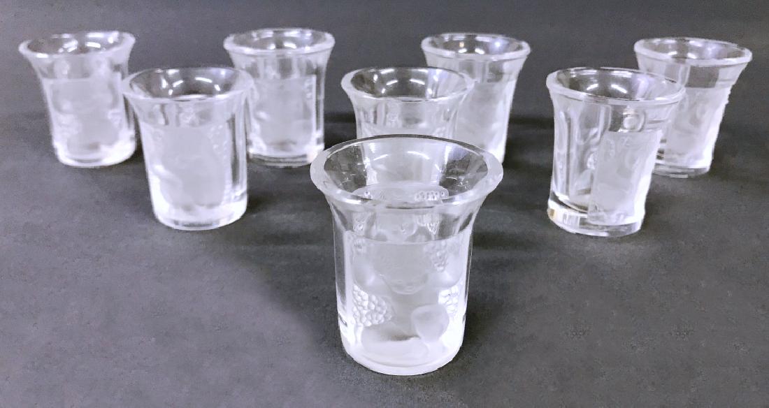 Eight Lalique Crystal Shot Glasses: Eight Lalique crystal liquor shot glasses, each 1 3/4"h x 1 1/2"dia