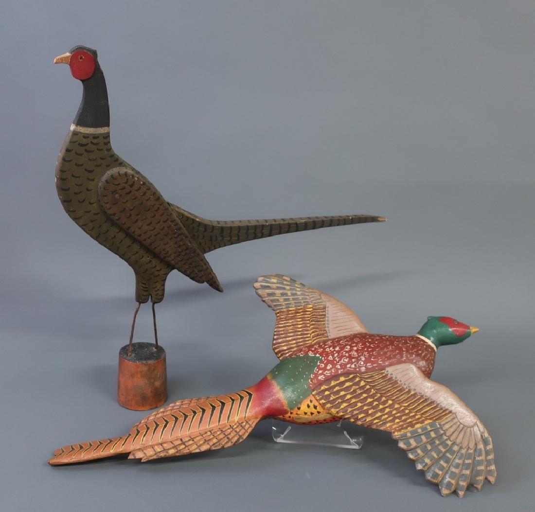 Two Carved and Painted Pheasants: Two Berks County carved and painted pheasants, standing example 20 1/2"h x 22 12"w