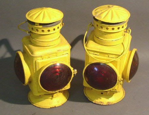 Pair of railroad marker lamps marked PRR and painte: Pair of railroad marker lamps marked PRR and painted yellow. 15.5"h.
