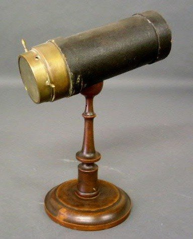Kaleidoscope, leather cased with brass fittings an