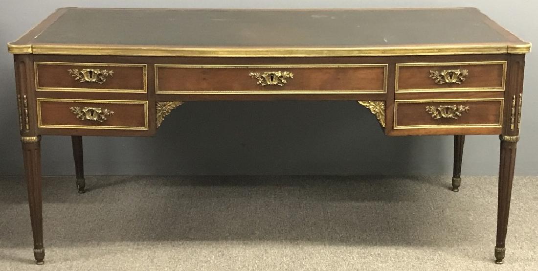 Fine French Mahogany Desk: Fine French mahogany desk, with brass ormolu mounts and black leather top, circa 1830, 29 1/4"h, top 63 1/2 " x 29 3//4" top