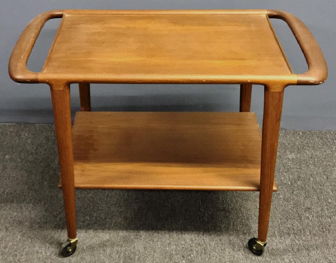 Danish Mid-Century Modern Dumb-Waiter: Danish mid-century modern dumb-waiter, labeled, "Illums Bolighus," Furniture Makers / Danish / Control," and "J.L. Moller Models / Made in Denmark," 22 1/2"h x 33"w