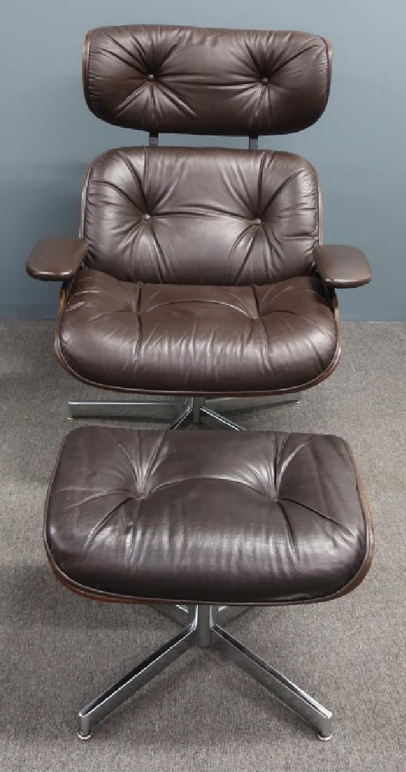 Selig Leather and Bentwood Eames Style Chair: Selig Manufacturing Co. leather and bentwood Eames style chair and ottoman, chair 39 3/4"h x 33 1/4"w x 30"d, ottoman 15"h x 21 1/2"w x 17"d