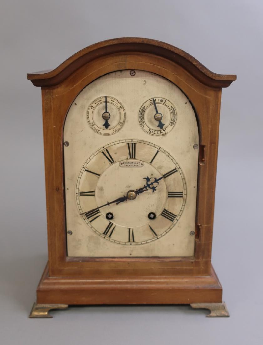 German Mahogany Cased Bracket Clock: German mahogany cased bracket clock, 20th c., the dial signed, "J.E. Caldwell & Co., Philadelphia", as found, 14"h x 9 1/2"w W.A.I. does not guarantee clocks to be complete or in working order.