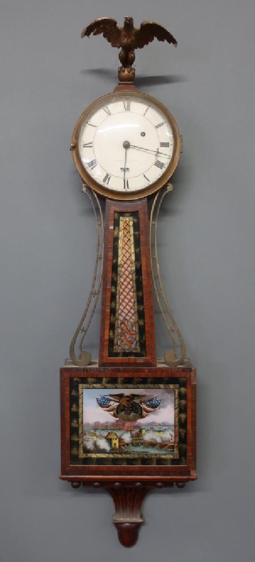 Presentation Mahogany Banjo Clock: Presentation mahogany banjo clock, clock face signed, "J.E. Caldwell, Philadelphia", with reverse decorated panel "Victory on Lake Champlain", works inscribed, "Walter H. Durfee, Providence," 41"l x 1