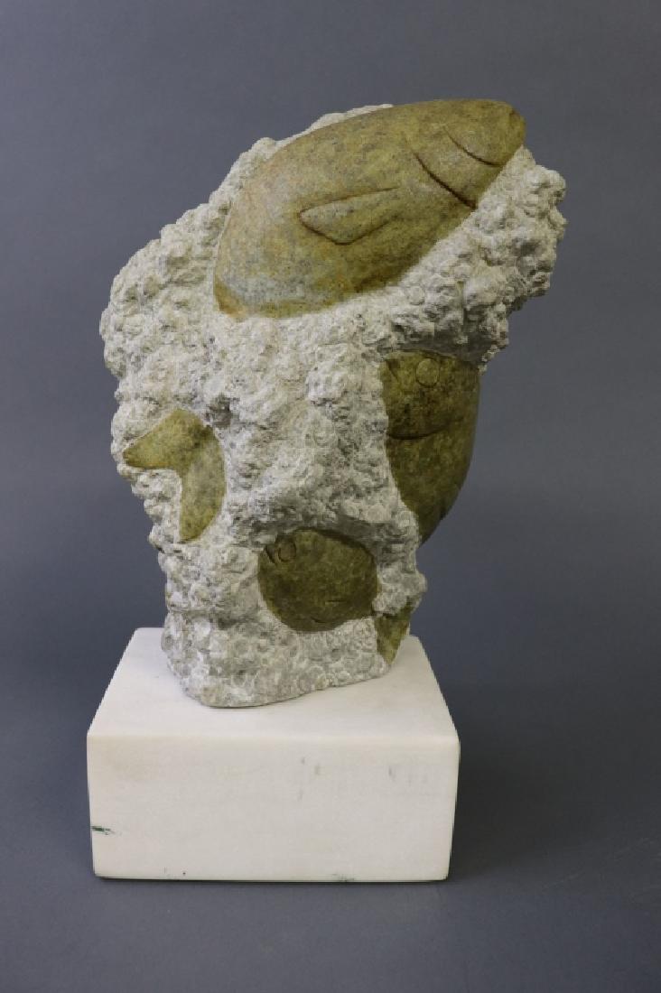 Inuit Style Stone Carving Sculpture of Fish: Inuit style stone carving sculpture of fish, unsigned, mounted on a marble base, sculpture 11"h x 8"w x 5 1/2"d, overall 14"h x 5 1/2"w x 8"d