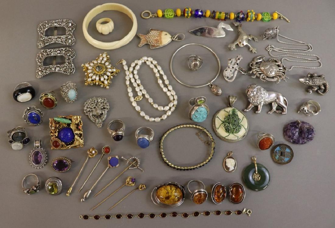 Costume and Silver Jewelry: Costume jewelry to include a Bohemian garnet bracelet, an agate cameo pendant, various animal motif silver jewelry, set of amber and sterling rings, pendant, and earrings, a collection of stick pins, 