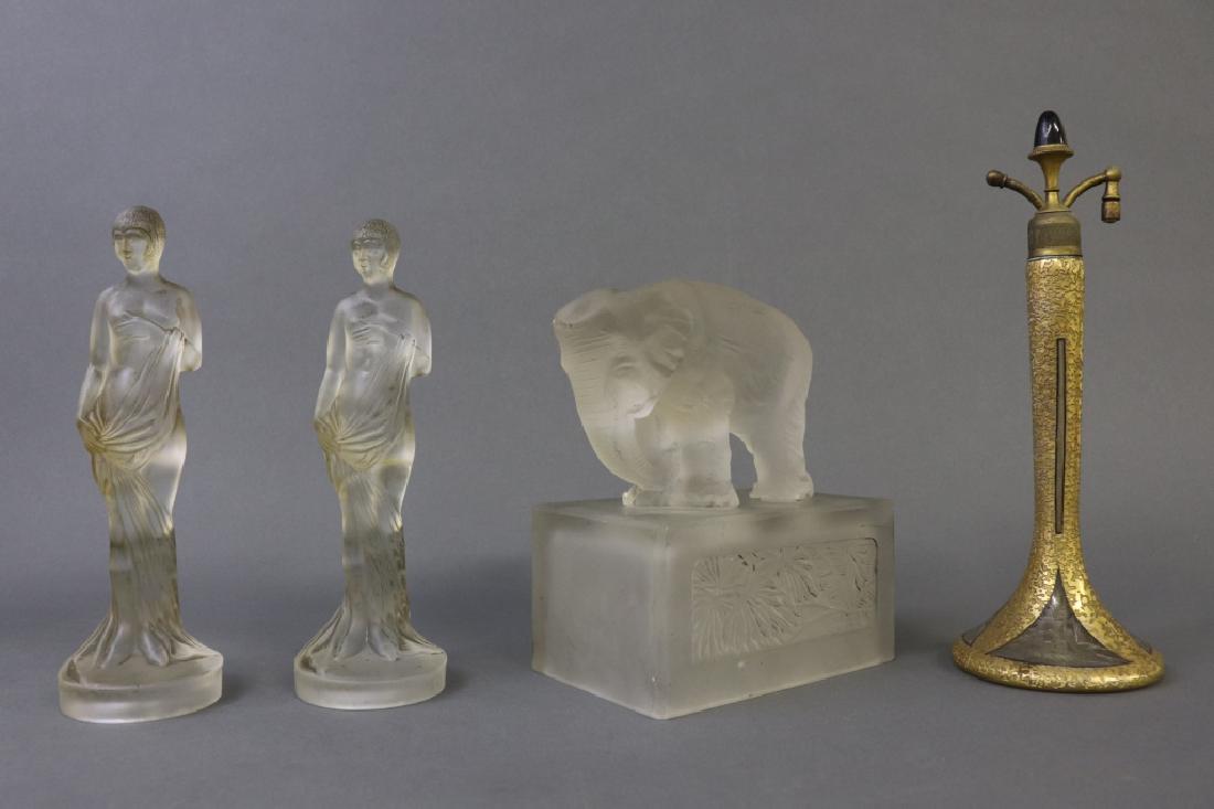 Art Deco Frosted Glass & DeVilbiss Bohemian Glass: Art Deco glass items to include a Heinrich Hoffman (1875 - 1939) Czech frosted glass elephant with glass base, marked "H. Hoffman", as found; two German pressed glass frosted statuettes (boudoir lamp