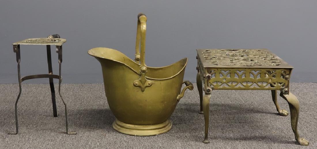 Brass Fireplace Trivets and Coal Scuttle: Two brass fireplace trivets, largest 11 1/2"h x 16 1/2"l, and coal scuttle