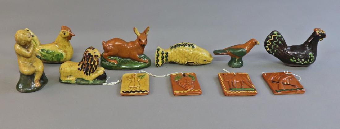 Mary & Greg Shooner Redware: Mary and Greg Shooner redware to include four ornament tiles, largest 2 3/4"l, six animals, and a cherub figurine, longest 4 1/2"
