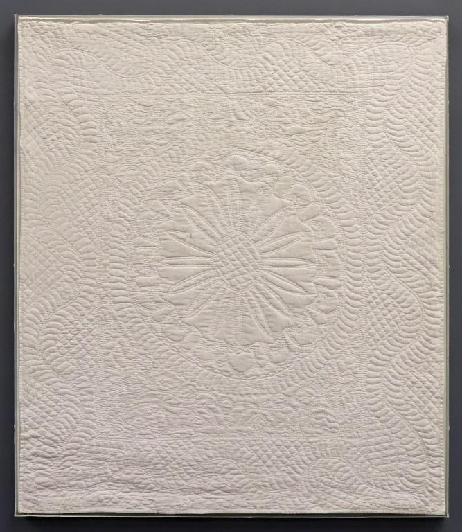 Fine White Applique Crib Quilt: Fine white applique crip quilt in frame, 39"h x 34"w