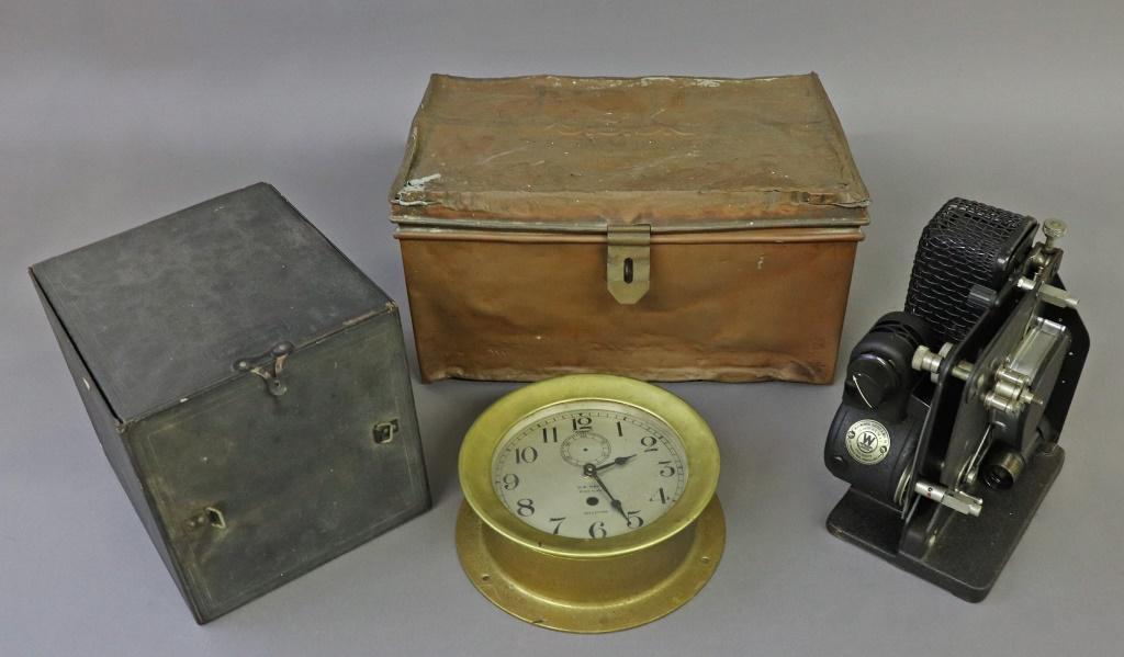 U.S. Coast Guard Copper Fuse Box, Projector, Etc: U.S. Coast Guard copper fuse box, 19th c., 7 1/2"h x 14"w, together with a WW II movie projector by Westinghouse and a Waltham brass ship's clock without works