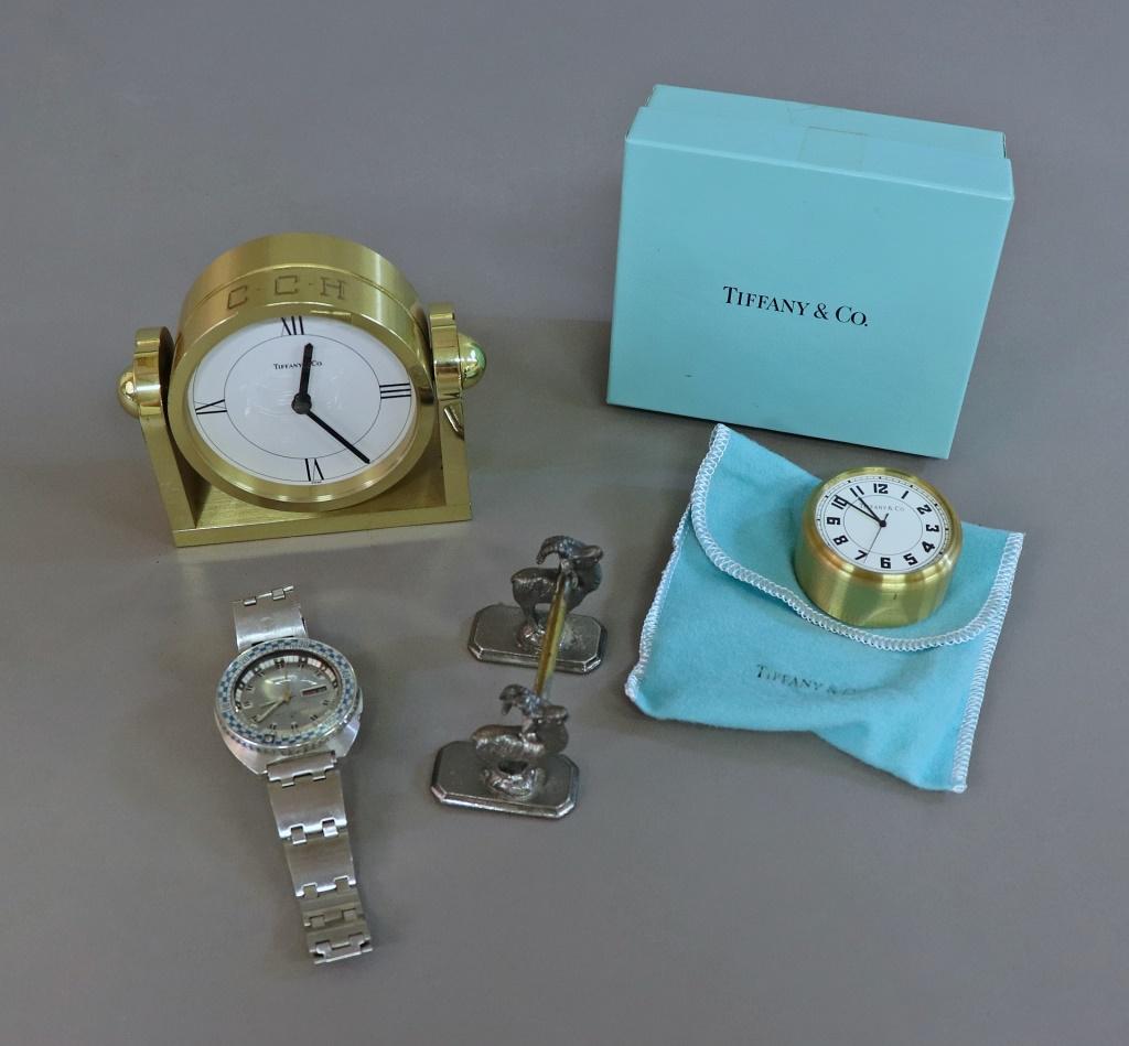Tiffany & Co. Brass Quartz Clock, Etc: Tiffany & Co. brass quartz clock, 3 1/2"h, together with a smaller example with box, Seiko men's watch, etc W.A.I. does not guarantee clocks or watches to be in working condition