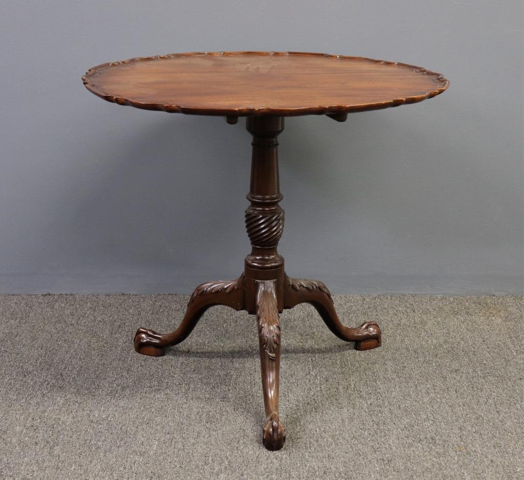 Chippendale Mahogany Pie Crust Tea Table: Chippendale mahogany pie crust tea table, 18th century, with acanthus carved knees and paw feet, 27 1/2"h x 30 1/2"dia
