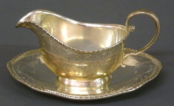Sterling silver gravy boat 3.5"h. and underplate 7