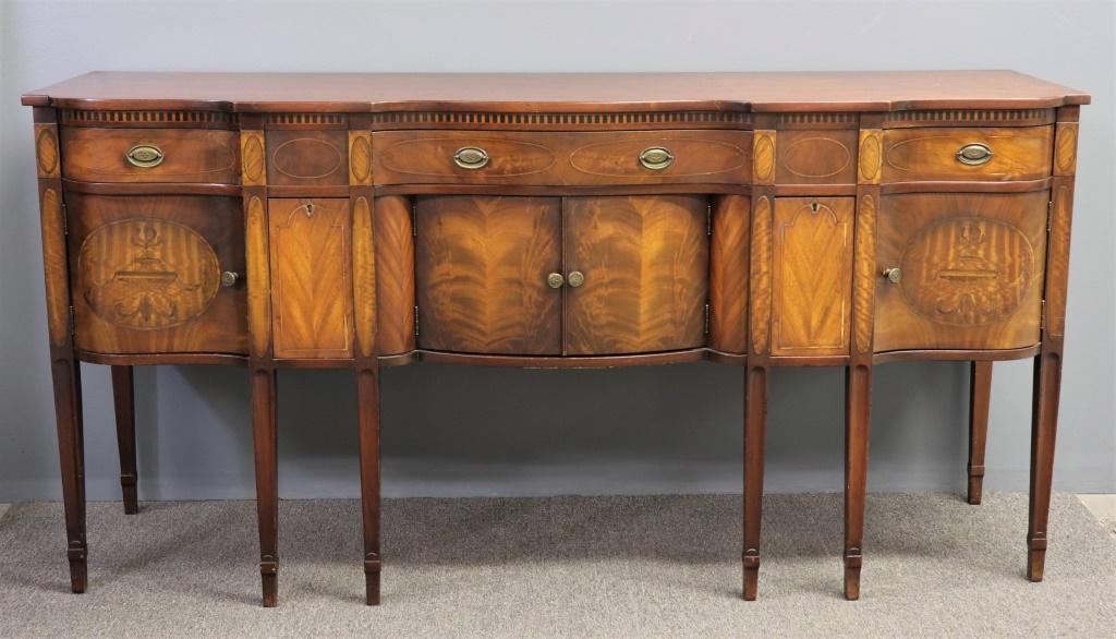 Hepplewhite Style Mahogany Inlaid Sideboard: Hepplewhite style mahogany inlaid sideboard by "Sacks" with shaped top and deep bottle drawers, 39"h x 78"w x 23"d
