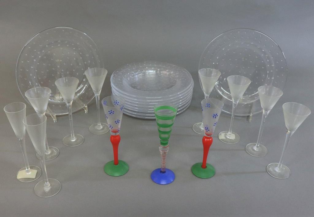 Orrefors Glasses and Plates: Twelve Orrefors glasses, each approximately 7 1/2"h, together with ten plates, 10 1/2"dia