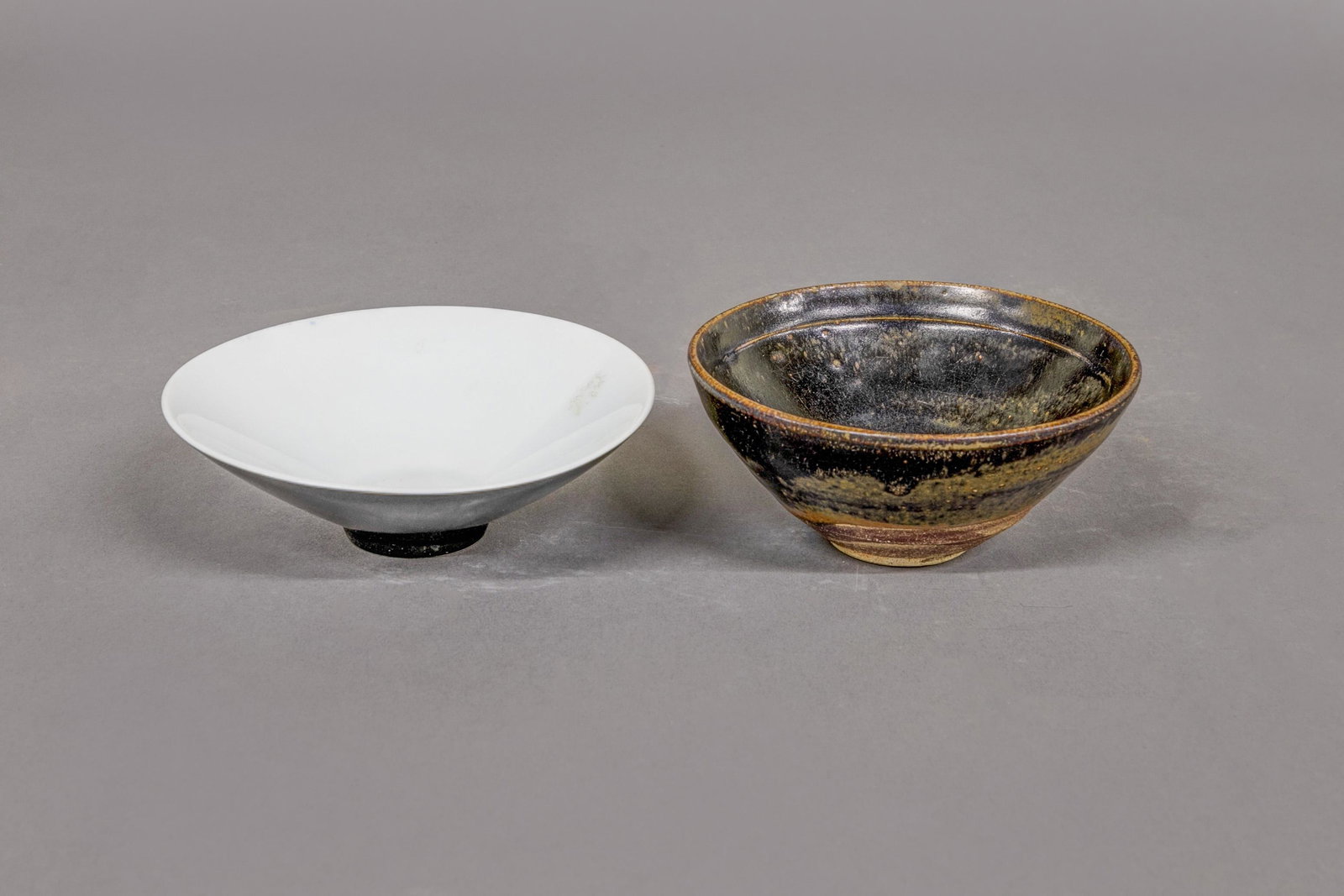 Chinese Bowls: Two Chinese blowls, one with brown glaze 2.25"H x 5"D