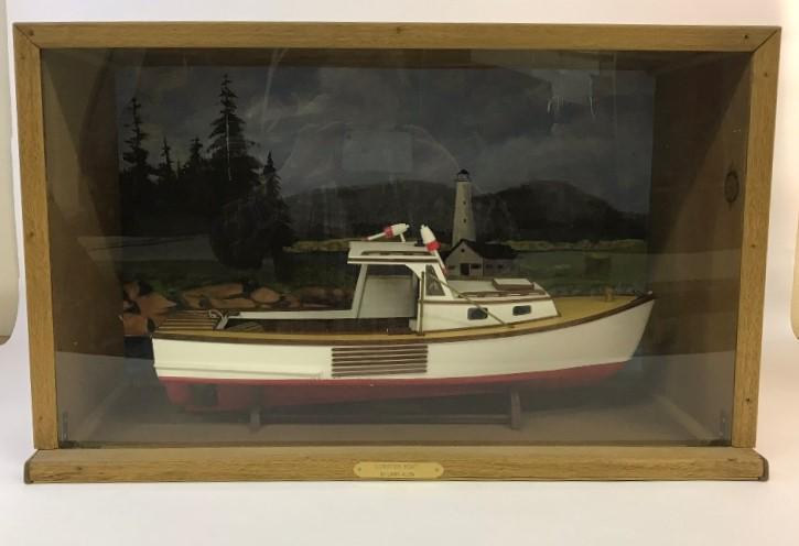 Wooden Boat Model Diorama: Handrafted wooden lobster boat model diorama, by Larry Allen Bass Harbor, Maine 17.5"h x 29"w x 11.75"d Condition: minor crack in plastic bottom left