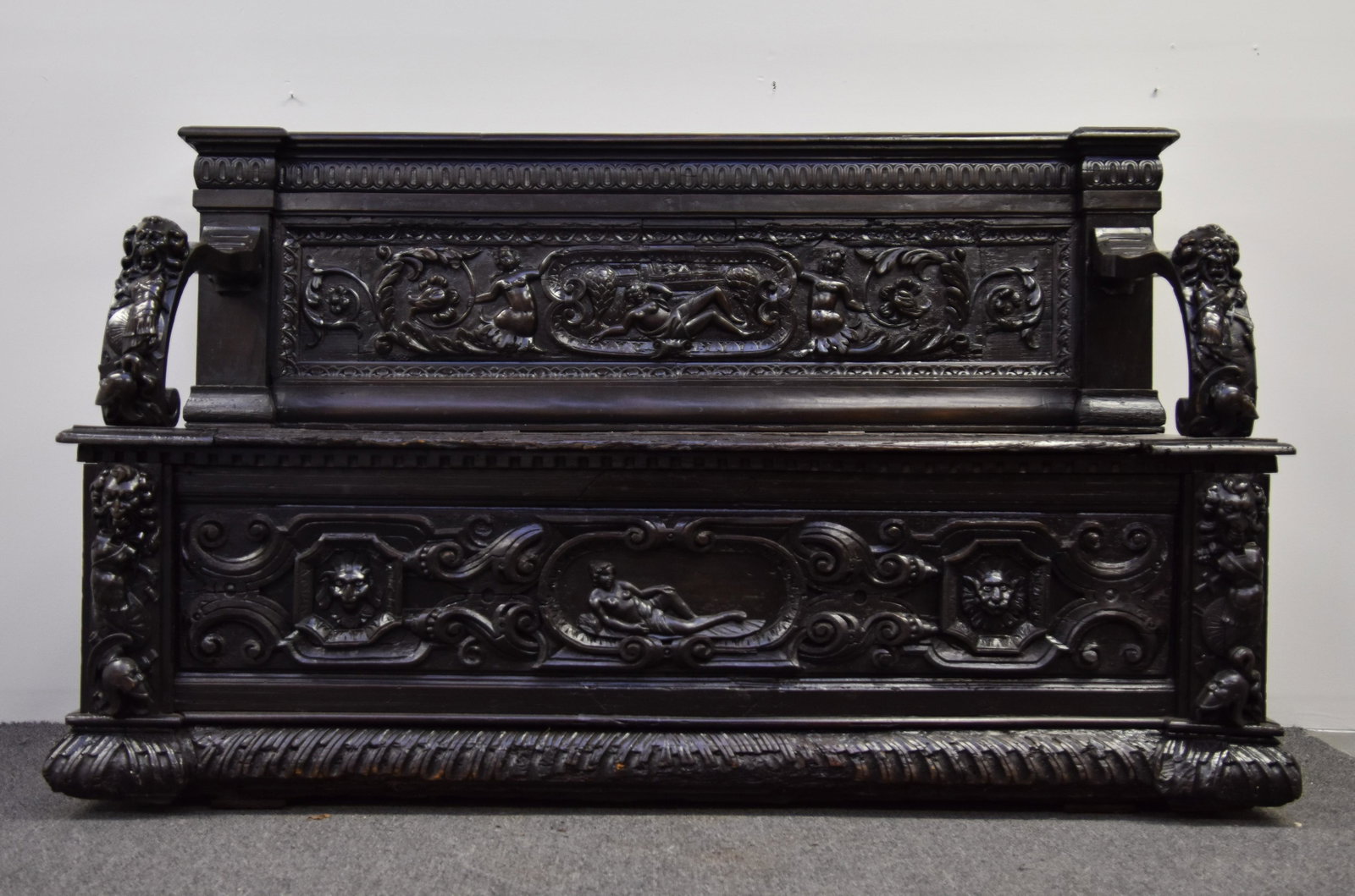 Italian Walnut Hall Bench Settee: Italian walnut hall bench settee, probably 17th c. with extensive carvings 43.5"h x 69"w x 24"d