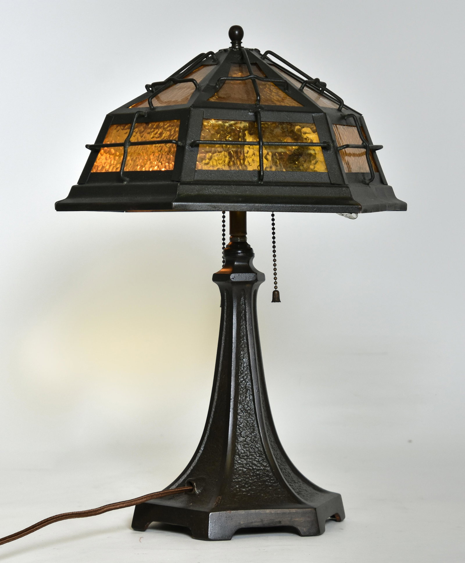 Arts & Crafts Iron Table Lamp: Arts & Crafts iron table lamp with amber glass shade 18.5"h x 11.5"dia