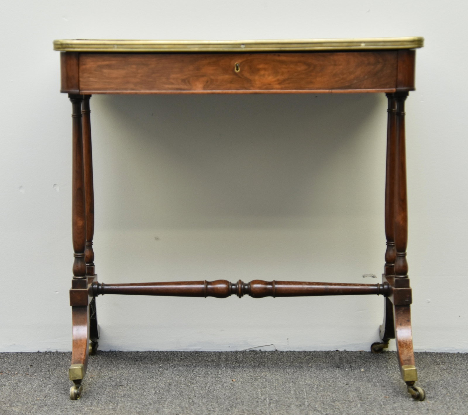 English Regency Table: English Regency table, 19th c. with brass banding and cuffs 28"h x 29"w x 18.25"d
