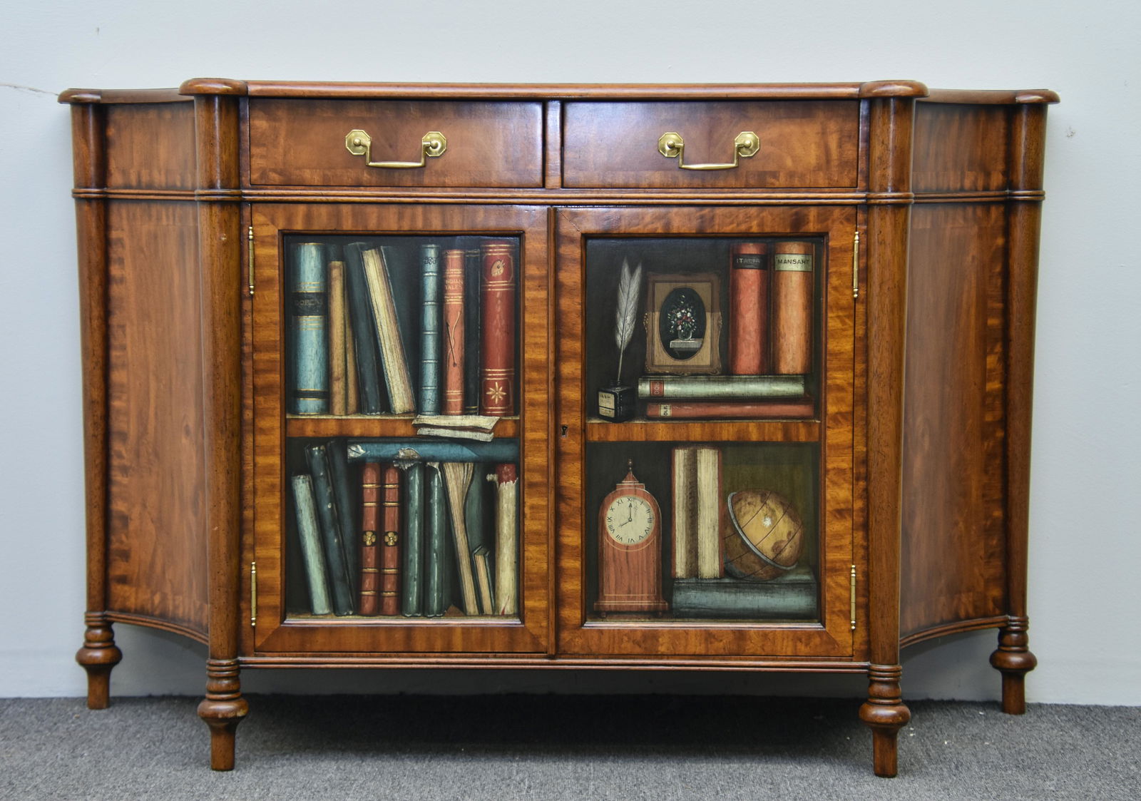 Maitland-Smith Two-Door Cabinet: Maitland-Smith two-door, two-drawer cabinet with faux panel books on door 32.5"l x 51"h x 18"d