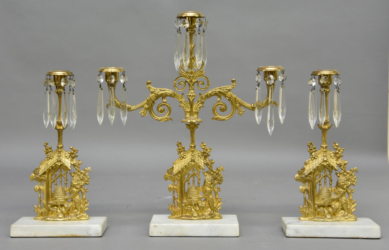 Three Piece Gilt and Marble Girondole: Three piece gilt metal and marble girondole set depicting bears after honey Tallest 17"h x 15"w x 4"d