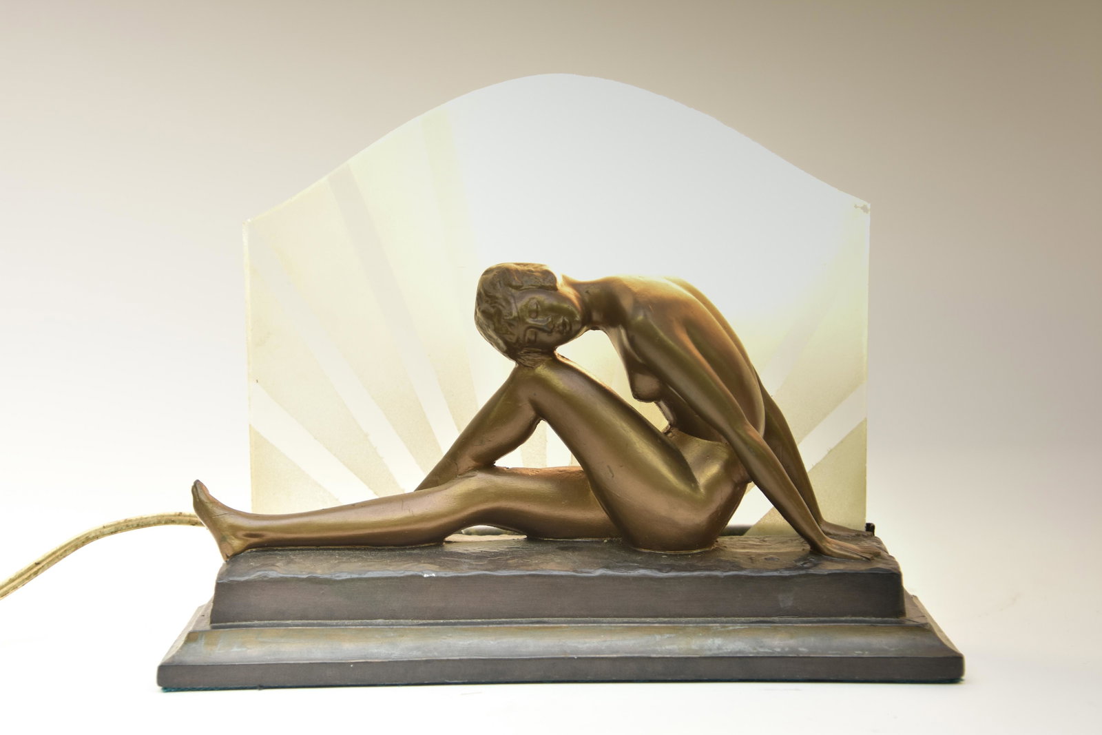 Art Deco Spelter Lamp: Art Deco spelter metal Lamp with reclining nude, circa 1920 7.5"h x 10"w x 3.75"d