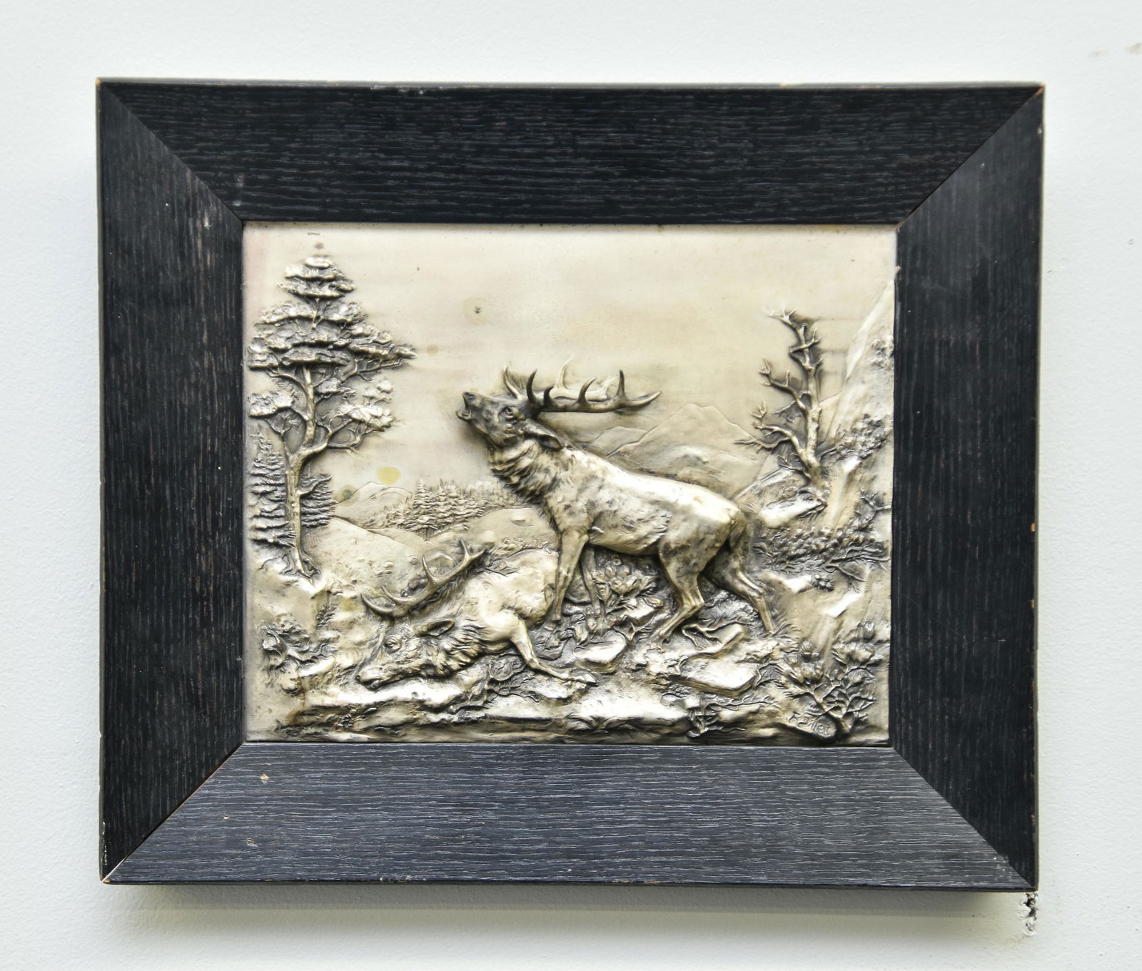 Fritz Diller Framed Relief of Elks: Fritz Diller (German, 1875-1946) silver over brass raised relief Bull Elks, signed F. Diller, mounted in an oak frame 9.75" x 12" sight size / 14.5" x 17" overall