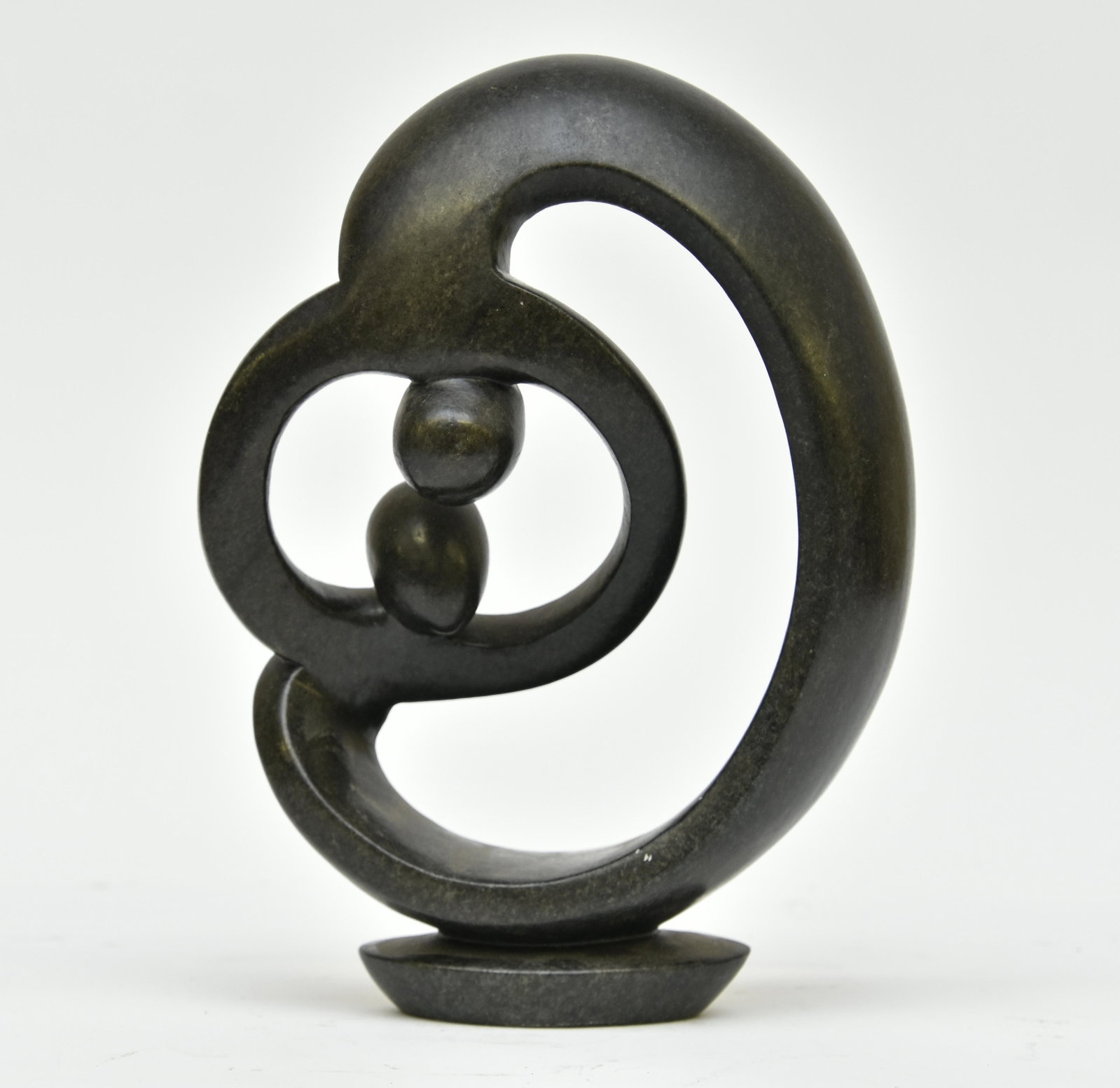 Carved Stone Abstract Sculpture: Elliot Rumano (African, 20th c.), carved stone abstract dancing figural sculpture, signed 12" x 9"