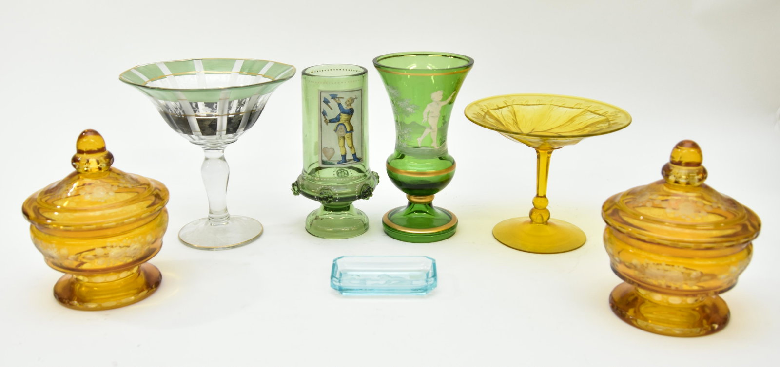Collection of Glassware: Collection of glassware to include an amber compote, two covered jars, a green glass, Mary Gregory vase etc. Tallest 8"h
