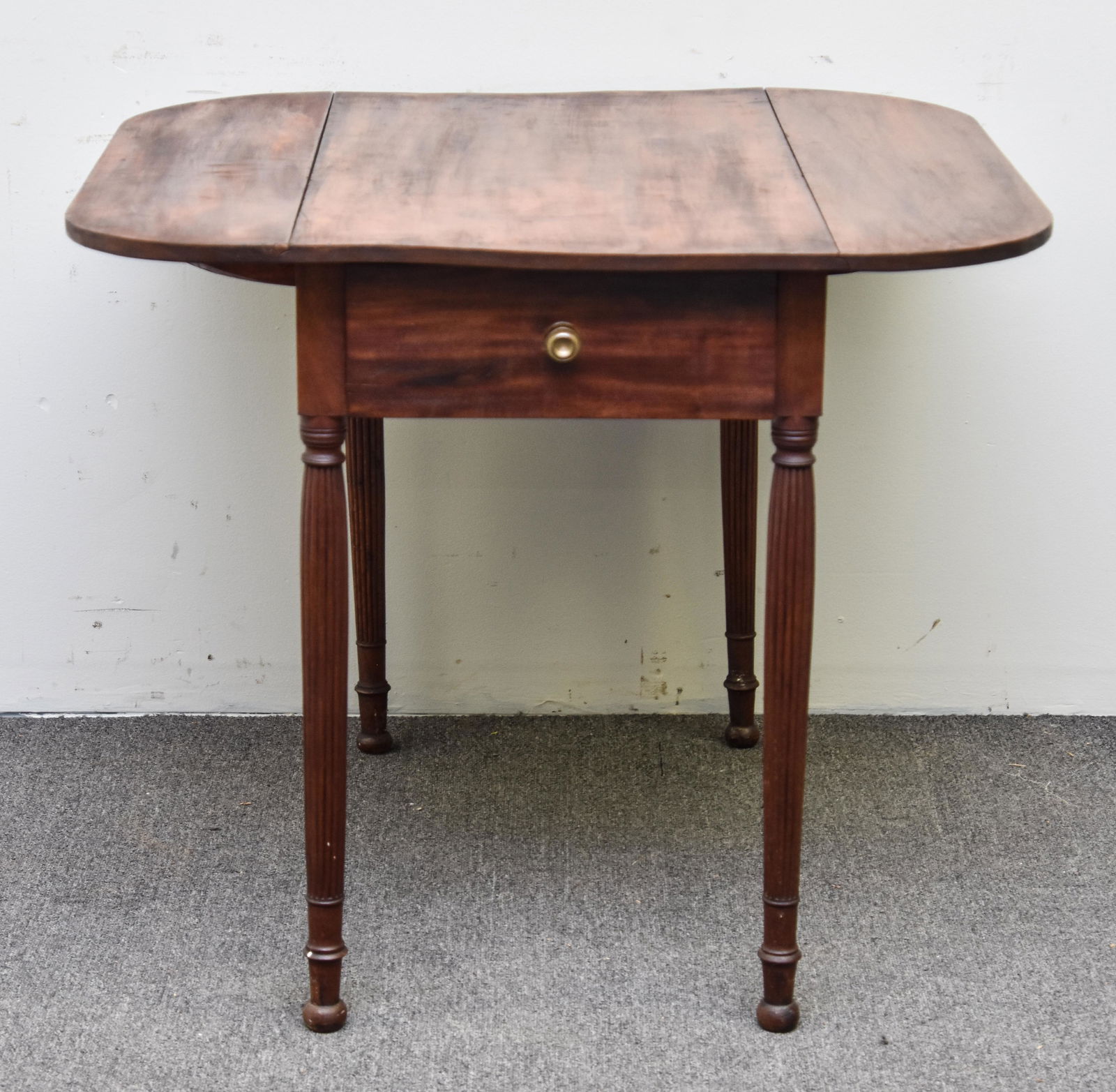 American Sheraton Drop-Leaf Table: American Sheraton mahogany drop-leaf table, circa 1820 with single drawer and reeded legs 29.75"h x 20"w x 36"d
