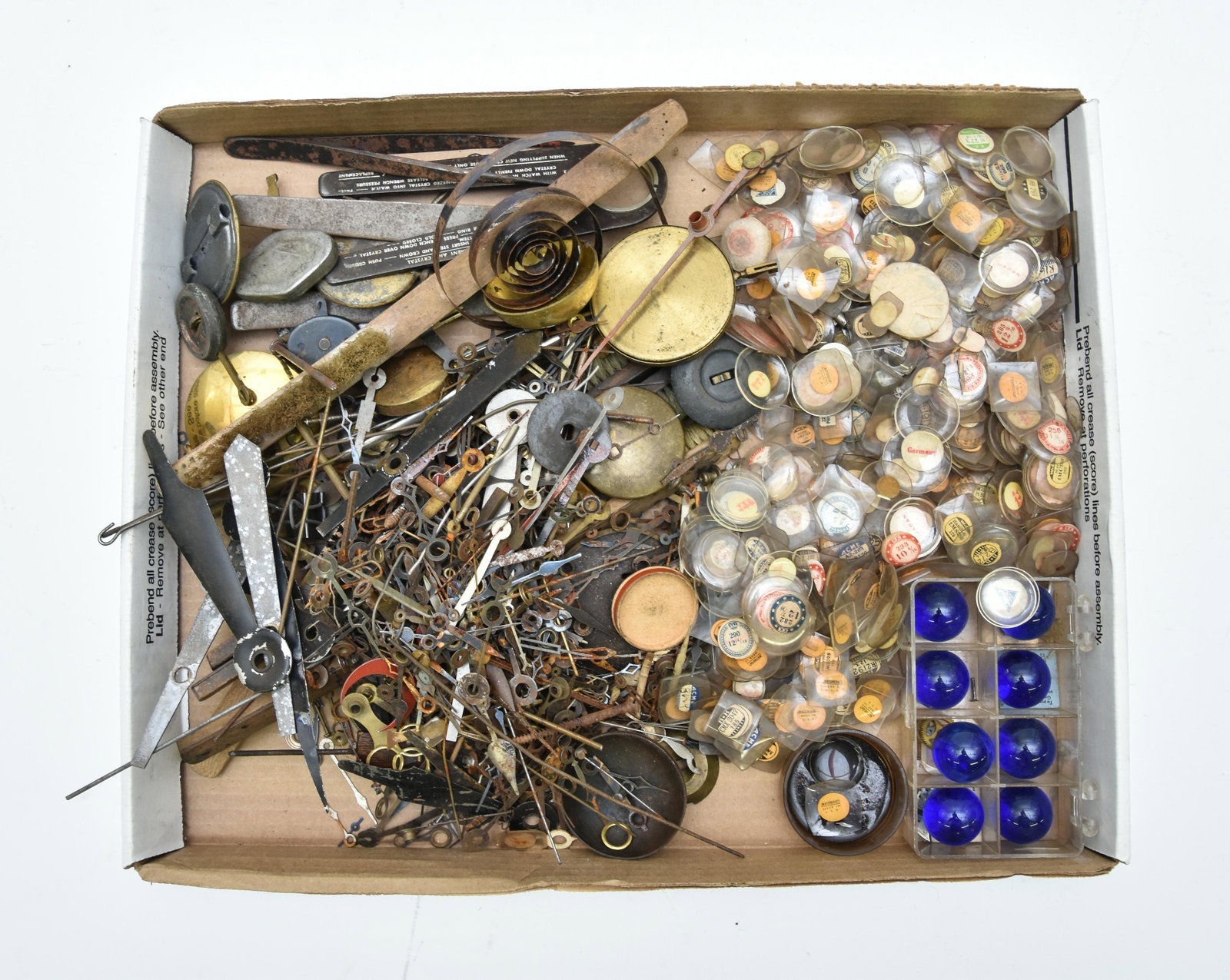 Clock and Watch Parts: Clock and watch parts including many crystals and hands etc.