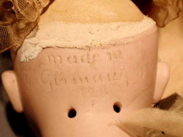 German bisque head doll #128. 18"h. - 2