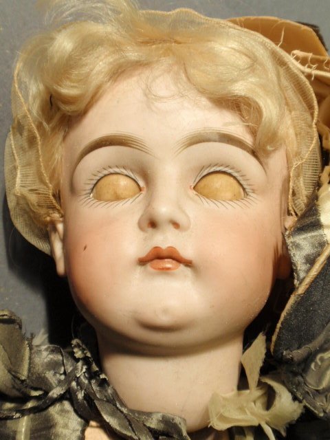 German bisque head doll #128. 18"h. - 3