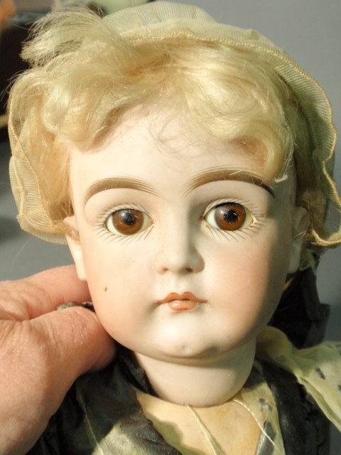 German bisque head doll #128. 18"h. - 4