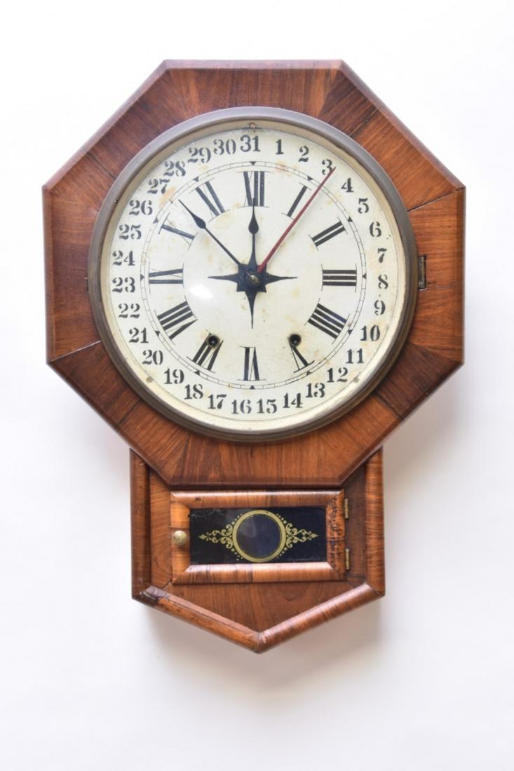 New Haven Calendar Wall Clock: New Haven calendar wall clock with 8-day works, circa 1890 23.5"h x 16.5"w x 4"d