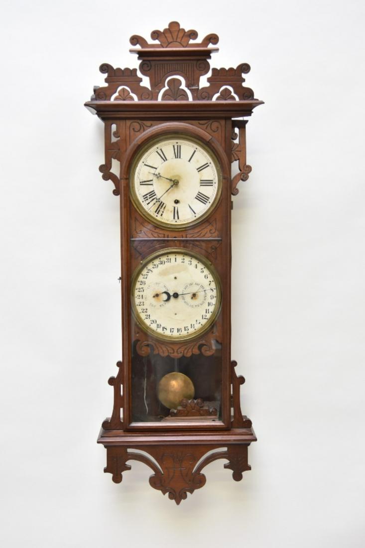 Welsh Damrosh Calendar Clock: Welsh Damrosh walnut carved double dial wall clock with Gale's calendar 42"h x 14"w x 6"d