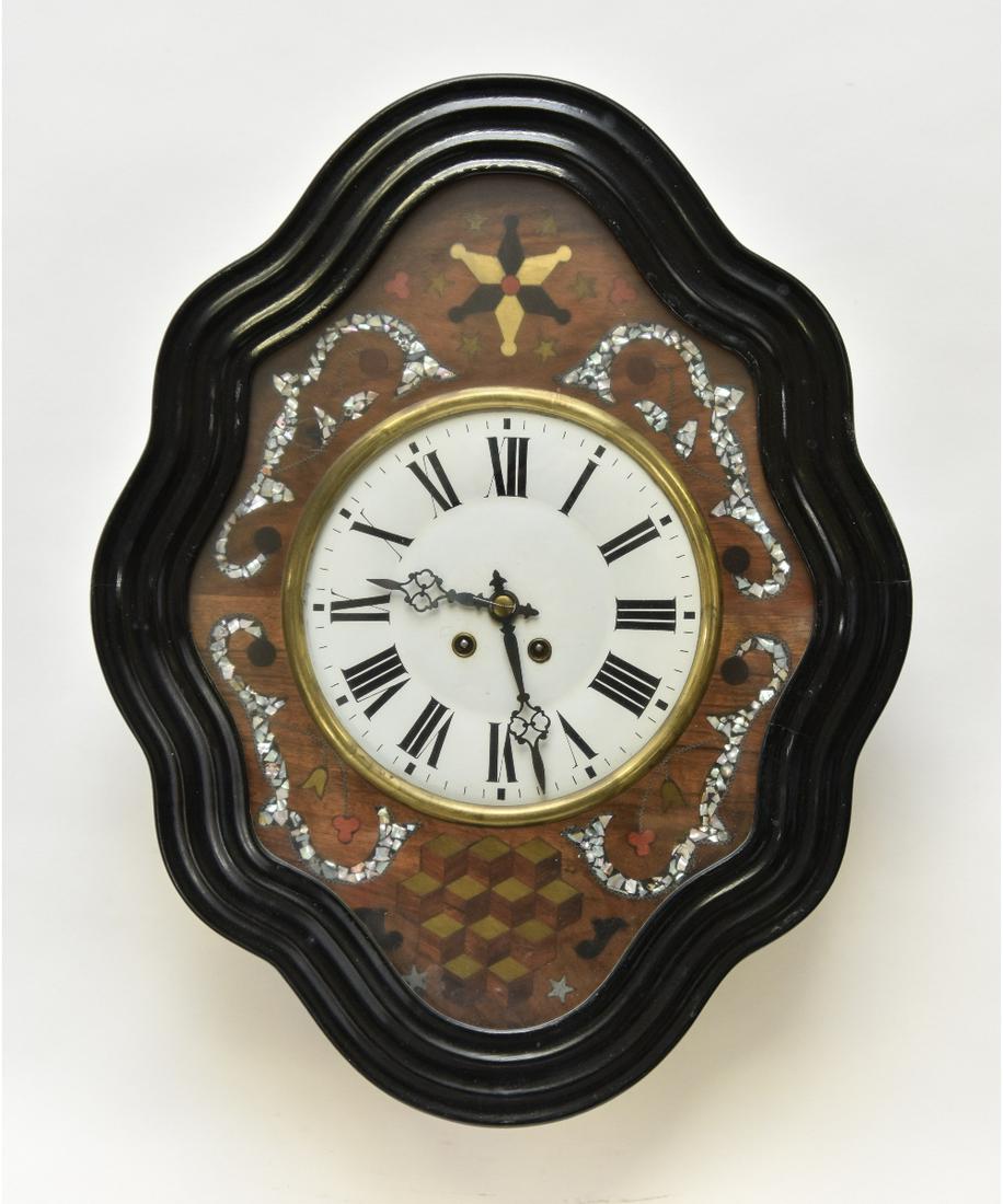 Victorian Clock with Mother-of-Pearl Inlay: Victorian wall clock with shaped frame door inlaid with mother-of-pearl 24"h x 18.5"w x 5.5"d