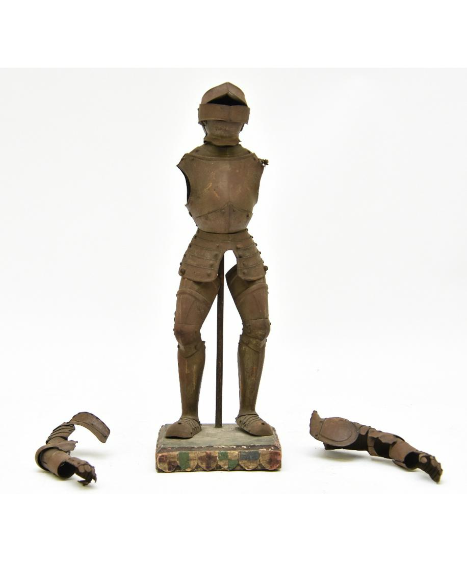 Medieval Miniature Tin Suite of Armor: Medieval miniature tin suit of armor, circa 1900, mounted on a wood base 15"h x 4.5"w