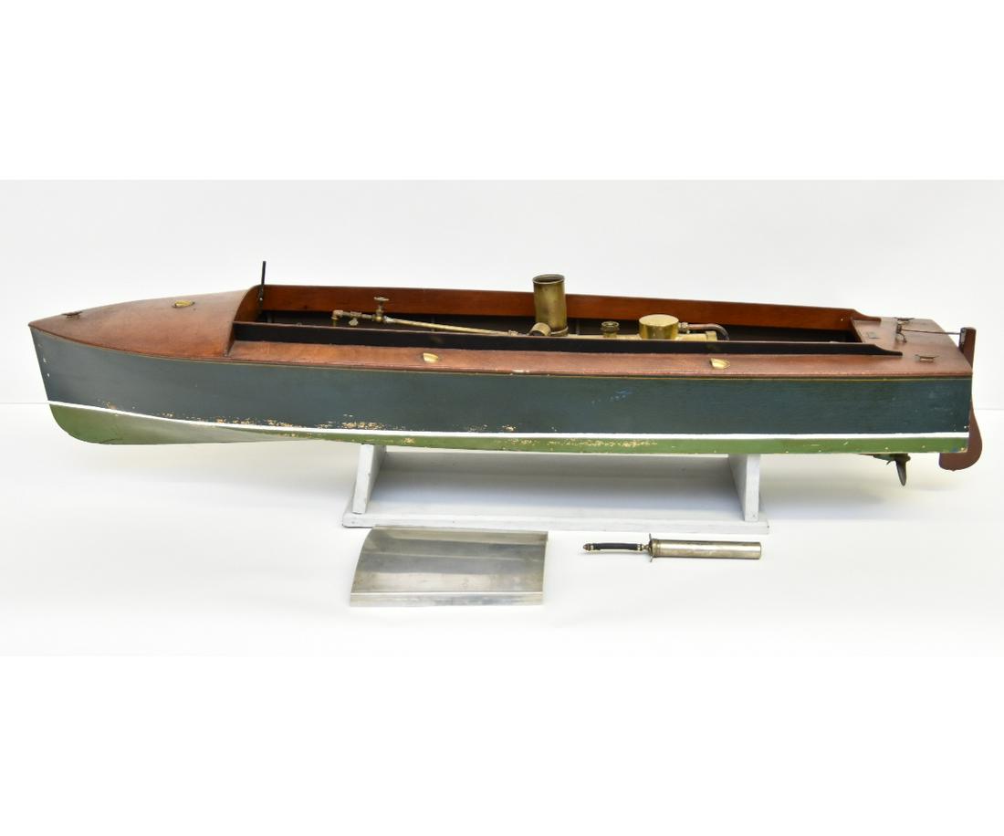 H.E. Boucher, N.Y. Live Steam Powered Boat: H.E. Boucher, N.Y. live steam powered boat, circa 1920, Barracuda series with two double piston engines mounted on a wood stand. 8"h x 48"l x 11"w / 11"h with stand