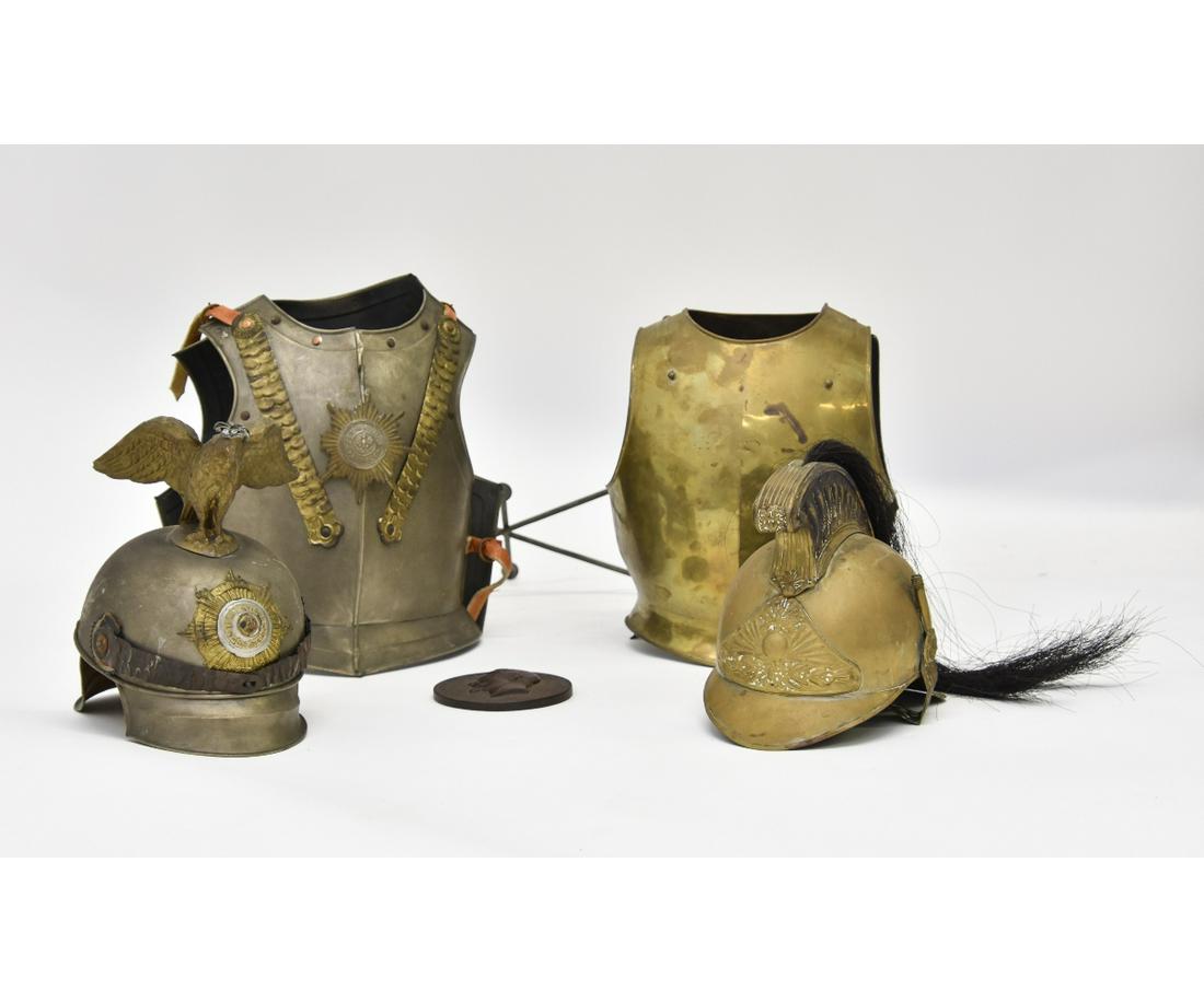 Two Small Suits of Armor: Two small partial suits of armor, one with armor torso and helmet signed "Suum Cuique" (Lat. To Each His Own), 12" x 9"; each torso includes wall holders, tallest helmet 10"h; together with Napoleon I
