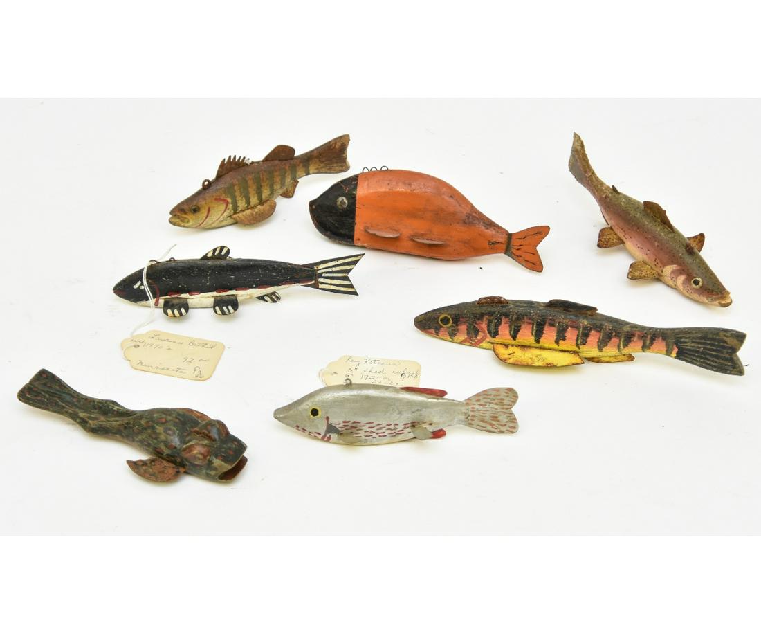 Seven Folk Art Ice Fishing Lures: Seven folk art Minnesota ice fishing lures, circa 1920 including a Ray Kotnaur shad; a Laurence Bethel fish; a frog etc. Longest 9"