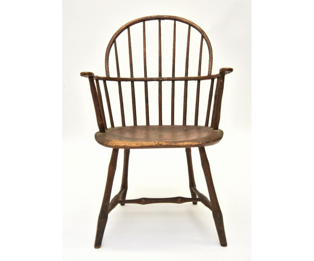 Windsor Armchair: Windsor armchair, circa 1790 retaining some of its original red paint decoration 37"h x 21"w x 16"d / seat height = 17.5