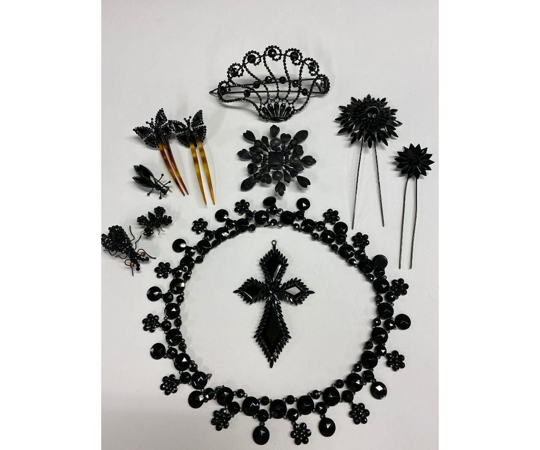 Victorian French Jet and Vauxhall Jewelry: Collection of mid to late 19th c. French black jet and black Vauxhall jewelry to include a necklace 7.5"dia, two butterfly hair sticks, two star burst hair sticks (largest 5" x 2.25"), two pendants (l
