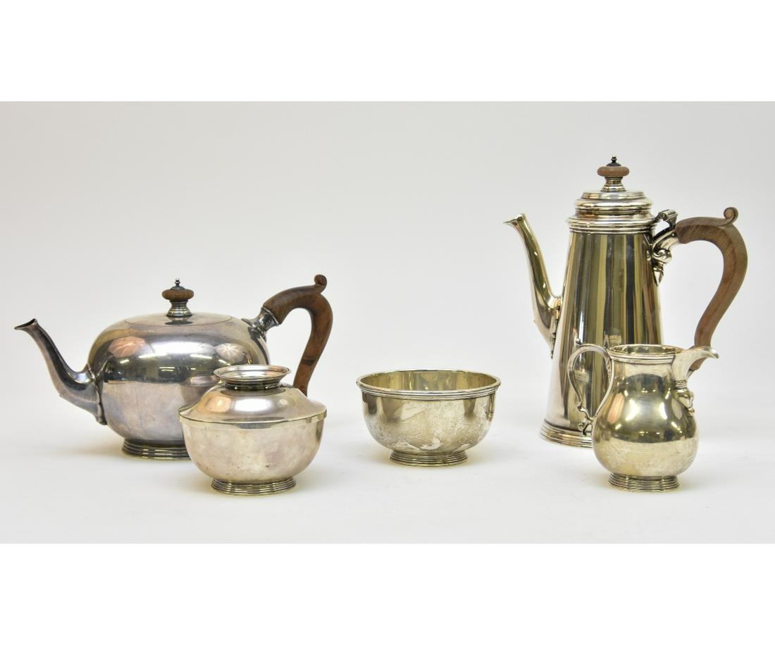 Five Piece Sterling Silver Tea Service: Five piece sterling silver tea service, 1720 reproduction probably by E. T. St. John Hartford, tallest 9"h / 68 troy ounces, with wood handles