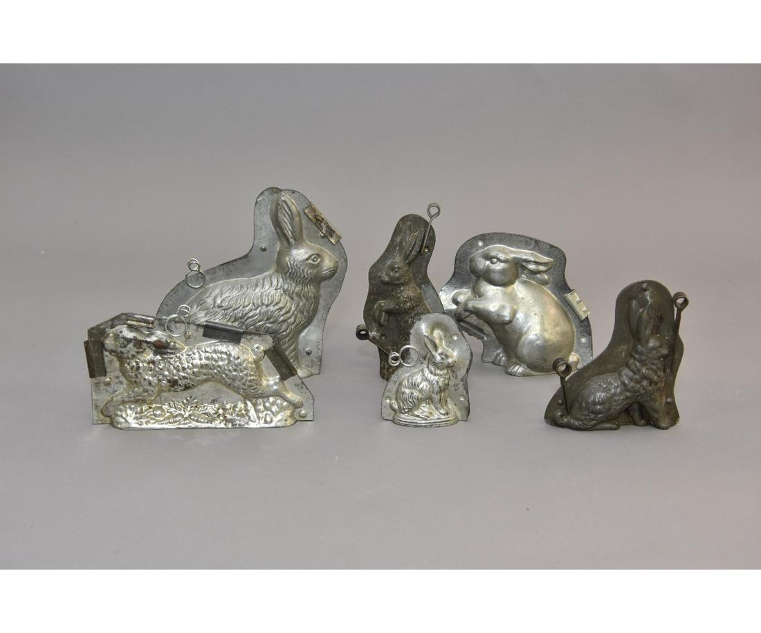 Six Rabbit Chocolate Molds: Six vintage rabbit chocolate molds, largest 8.5"h x 8"w x 2.5"d
