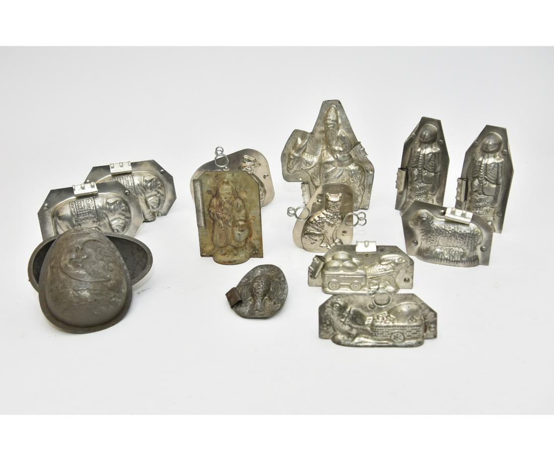 Thirteen Metal Chocolate Molds: Thirteen metal chocolate molds, some vintage Largest 7"h x 5.5"w